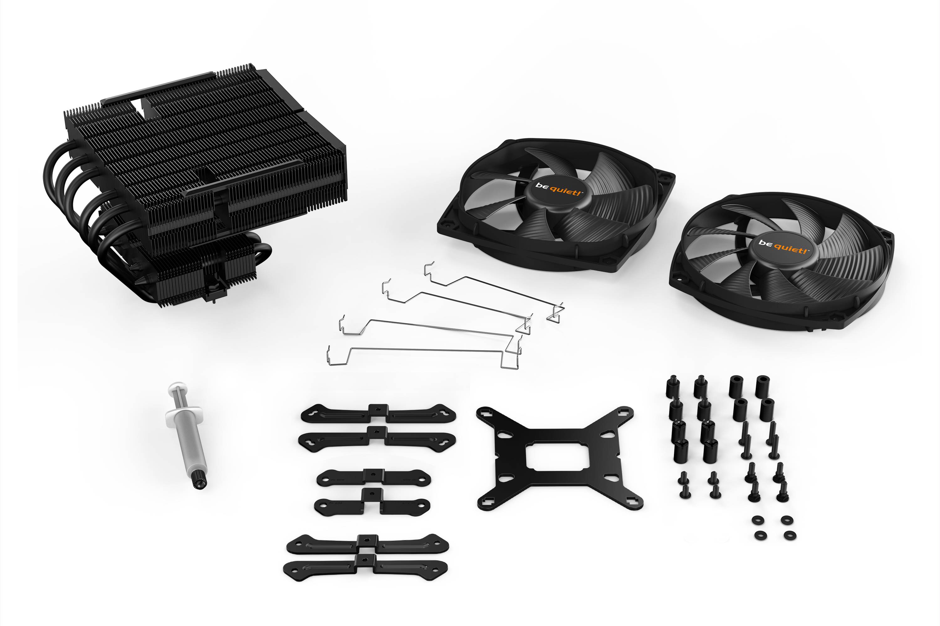 Kit de refroidissement comprenant deux ventilateurs, un dissipateur thermique, une seringue de pâte thermique, des supports et des vis pour le refroidissement du processeur.