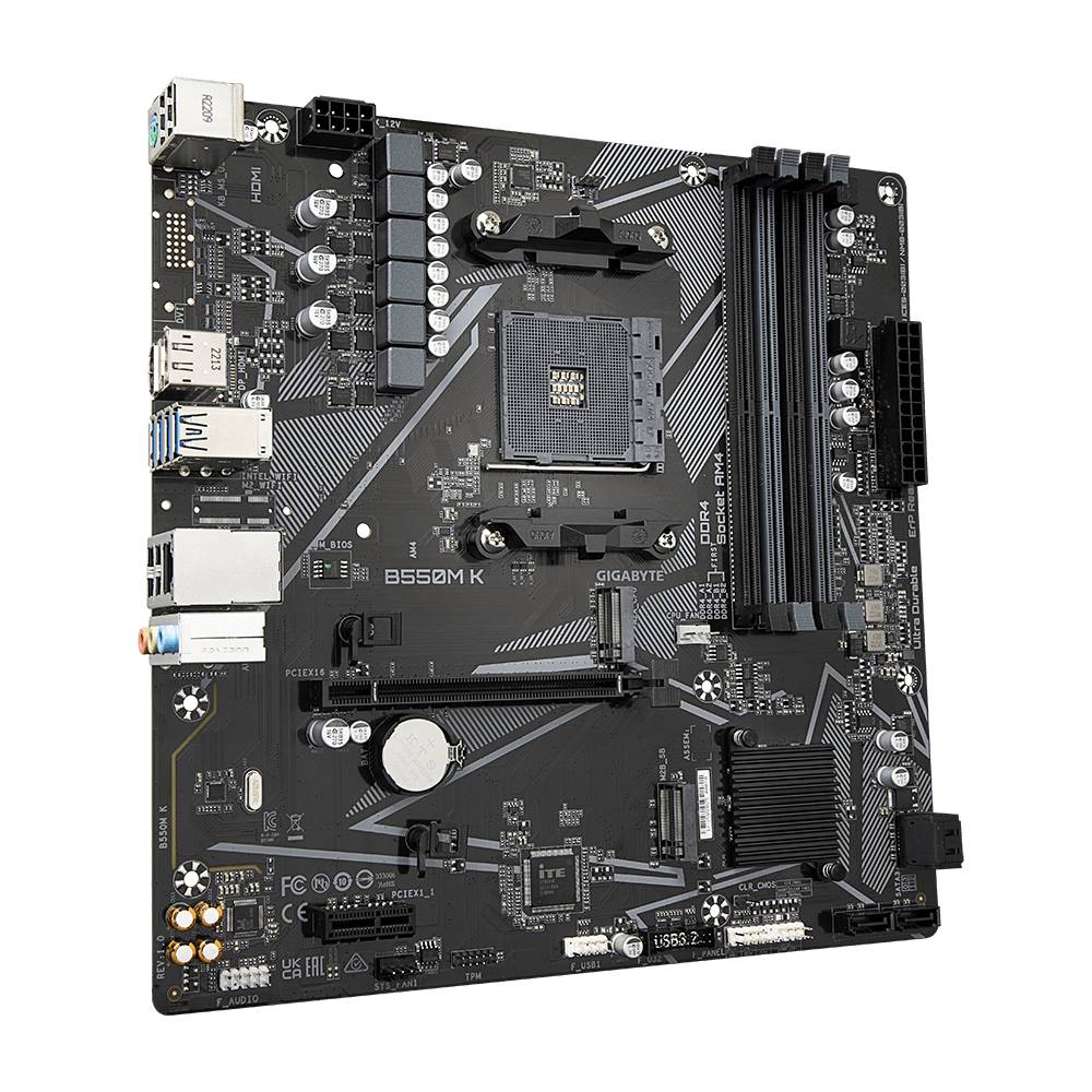 Carte mère avec socket AM4, quatre emplacements RAM et plusieurs emplacements d'extension PCIe. Convient aux processeurs AMD.