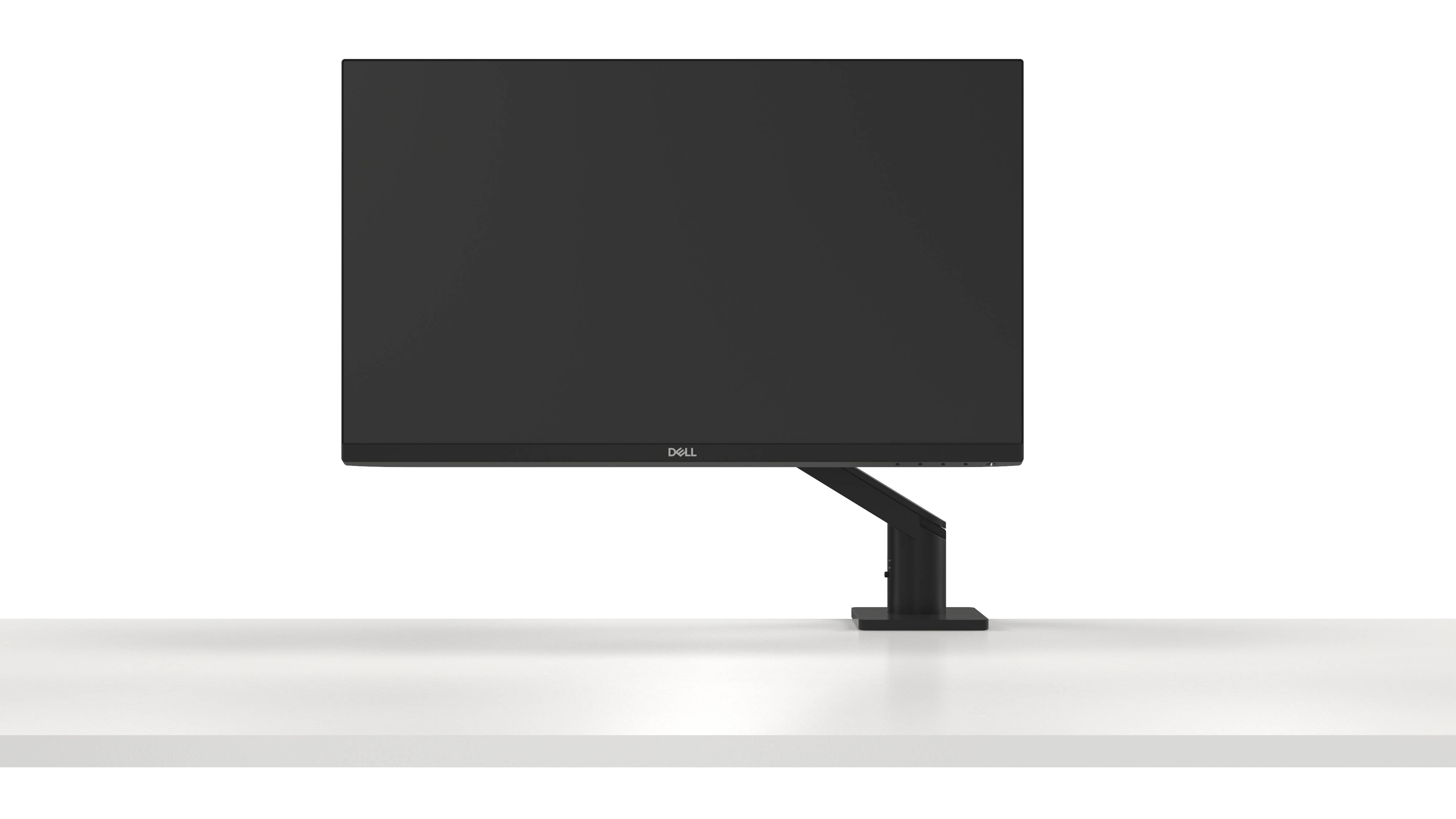Un moniteur à écran plat noir sur un bureau blanc, fixé à un bras ajustable.