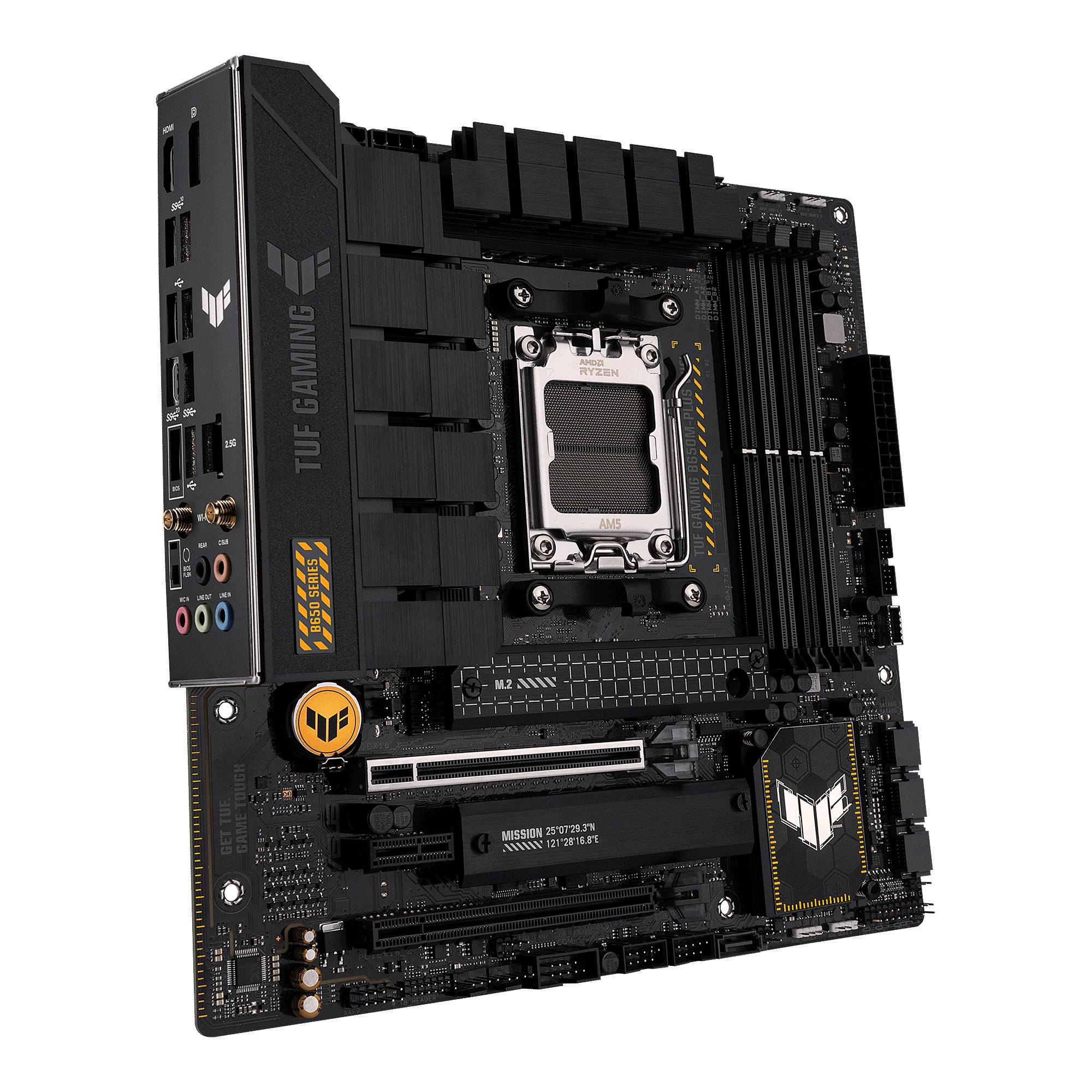 Une carte mère noire portant l'inscription 'TUF GAMING'. Plusieurs connexions, dissipateurs thermiques et emplacements sont visibles.