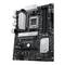Une carte mère ASUS Prime B550-Plus avec plusieurs emplacements et connecteurs, notamment un socket CPU et des emplacements RAM.