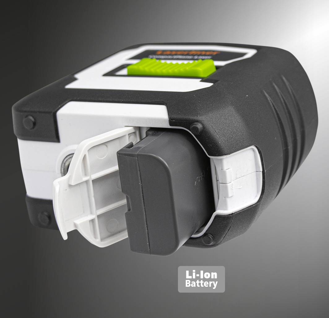 Un appareil noir et blanc avec un bouton vert et une batterie lithium-ion amovible est présenté sur un fond gris.