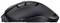 Souris sans fil noire au design ergonomique, avec touches latérales et molette de défilement, idéale pour un travail confortable sur ordinateur.