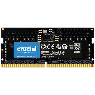 Gros plan d'un module de mémoire SODIMM DDR5 de Crucial avec des détails techniques et un avertissement indiquant la perte de garantie en cas de retrait de l'étiquette.