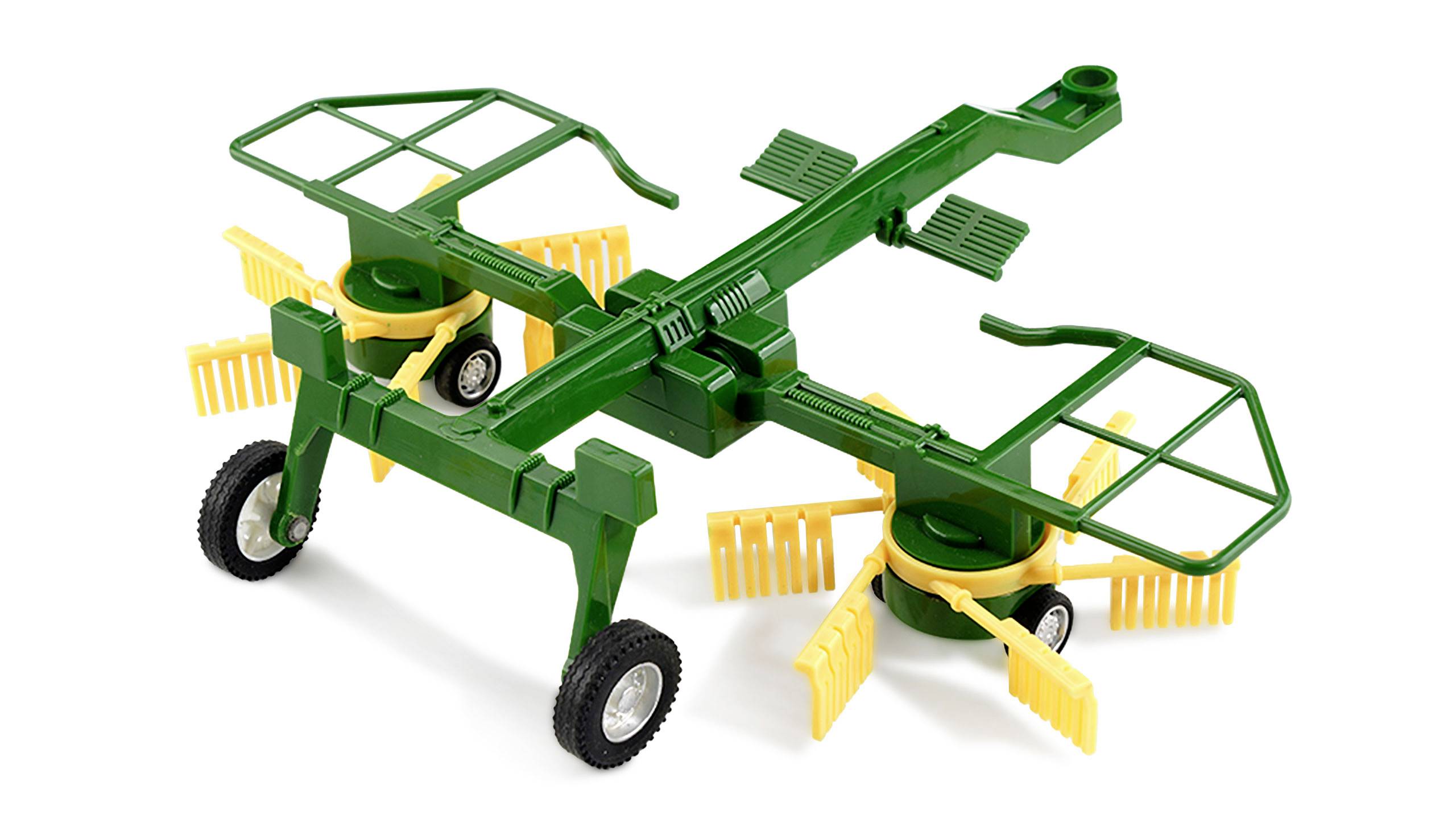 Faucheuse jouet en plastique verte et jaune avec quatre roues et un râteau jaune.