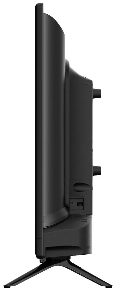 Un téléviseur à écran plat vu de profil. L'écran est très fin et repose sur un socle étroit.