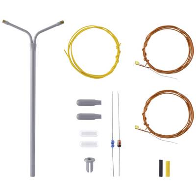 Kit de composants électroniques comprenant un élément gris en forme de Y, des câbles jaunes et bruns, des résistances, des gaines thermorétractables et des connecteurs.