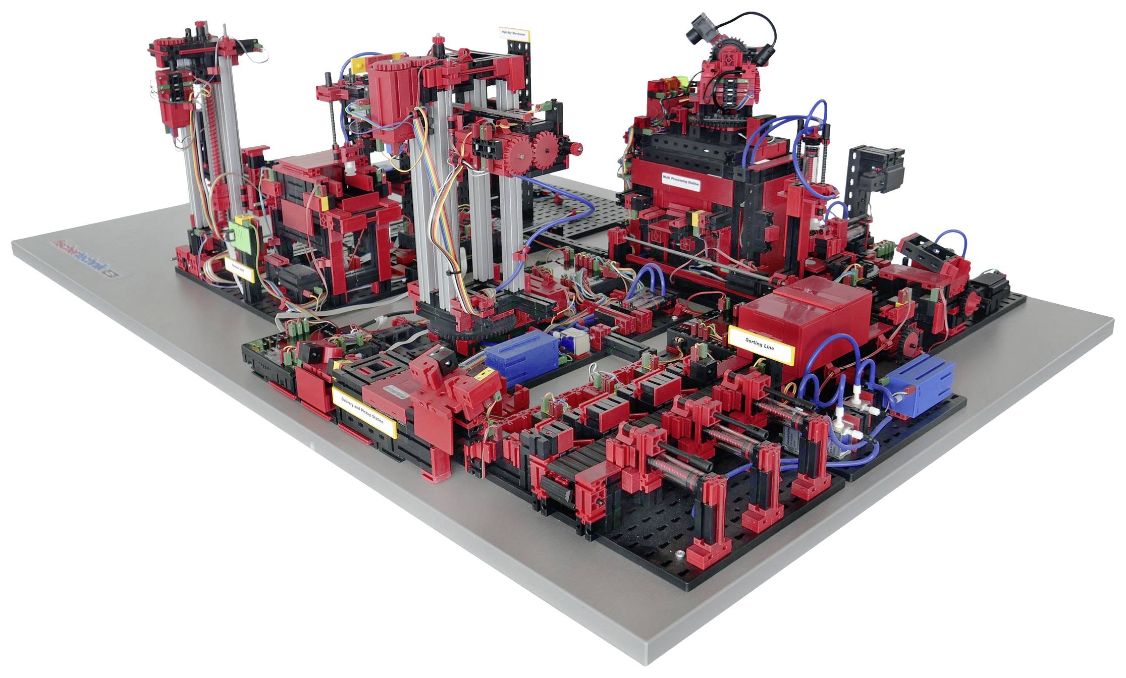 Un modèle technique complexe composé de blocs rouges et noirs simulant des machines et des convoyeurs.
