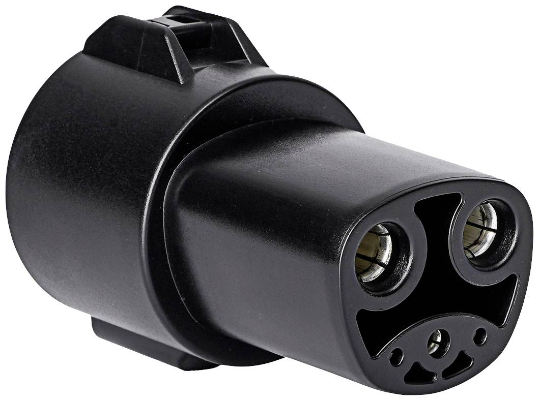 Un connecteur de charge noir pour véhicules électriques avec deux contacts ronds et un emplacement inférieur, vu de face.