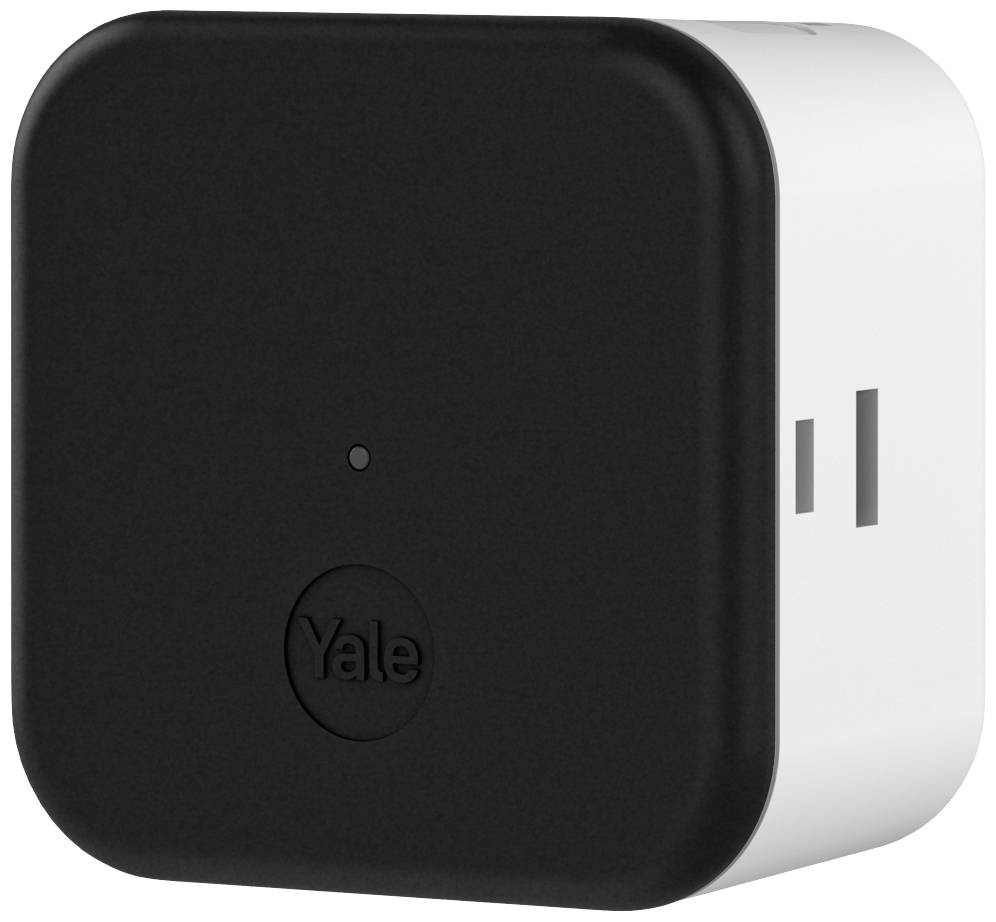 Un appareil domotique carré noir et blanc avec le logo 'Yale' au centre, vraisemblablement un contrôleur de serrure connectée.