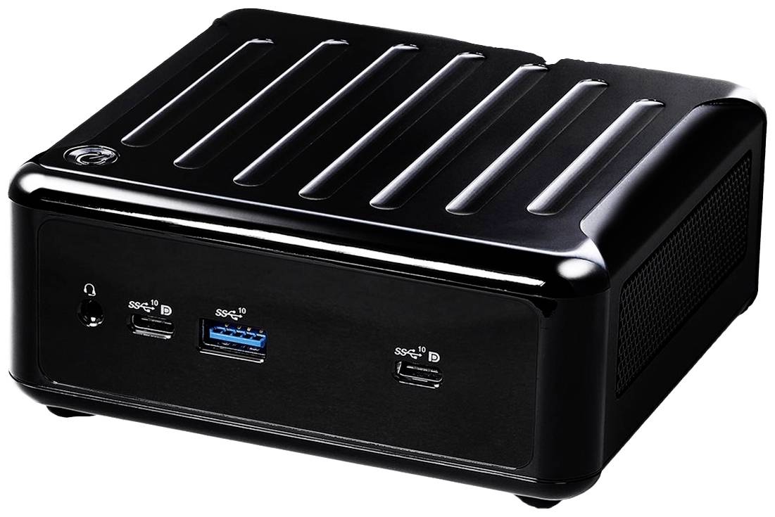 Un petit ordinateur noir avec plusieurs ports USB à l'avant. Adapté aux postes de travail compacts ou aux centres multimédia.