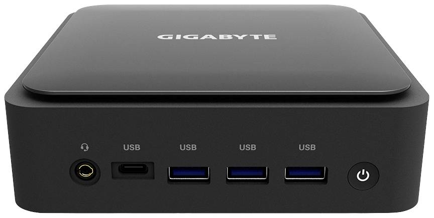 Mini-PC noir de Gigabyte, vue de face avec ports : casque, USB-C, trois ports USB-A, bouton d'alimentation.