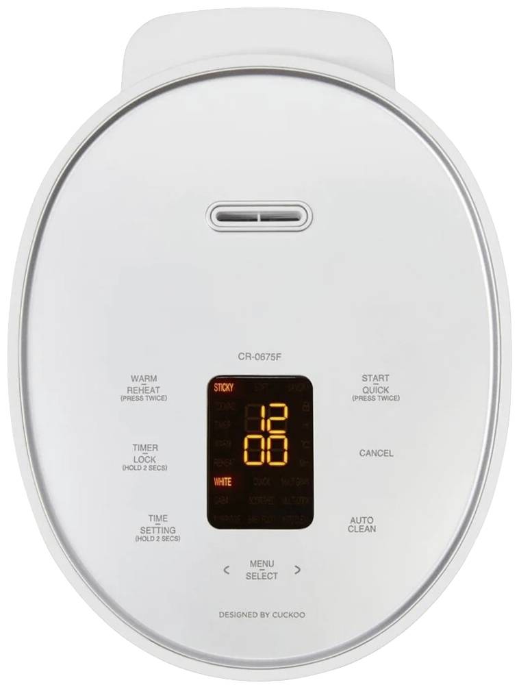 Un cuiseur à riz ovale avec un affichage numérique indique '12:00'. Des touches pour les fonctions de minuterie, de menu et de nettoyage automatique sont visibles.