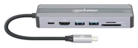 Un hub USB-C avec ports : HDMI, deux USB 3.0, lecteur de carte SD, Ethernet et USB-C. Marque 'Manhattan' visible sur l'appareil.