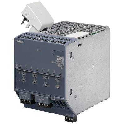 L'image présente un module gris CNX8600 doté de plusieurs connexions et interrupteurs. Un adaptateur blanc est placé sur le dessus de l'appareil.