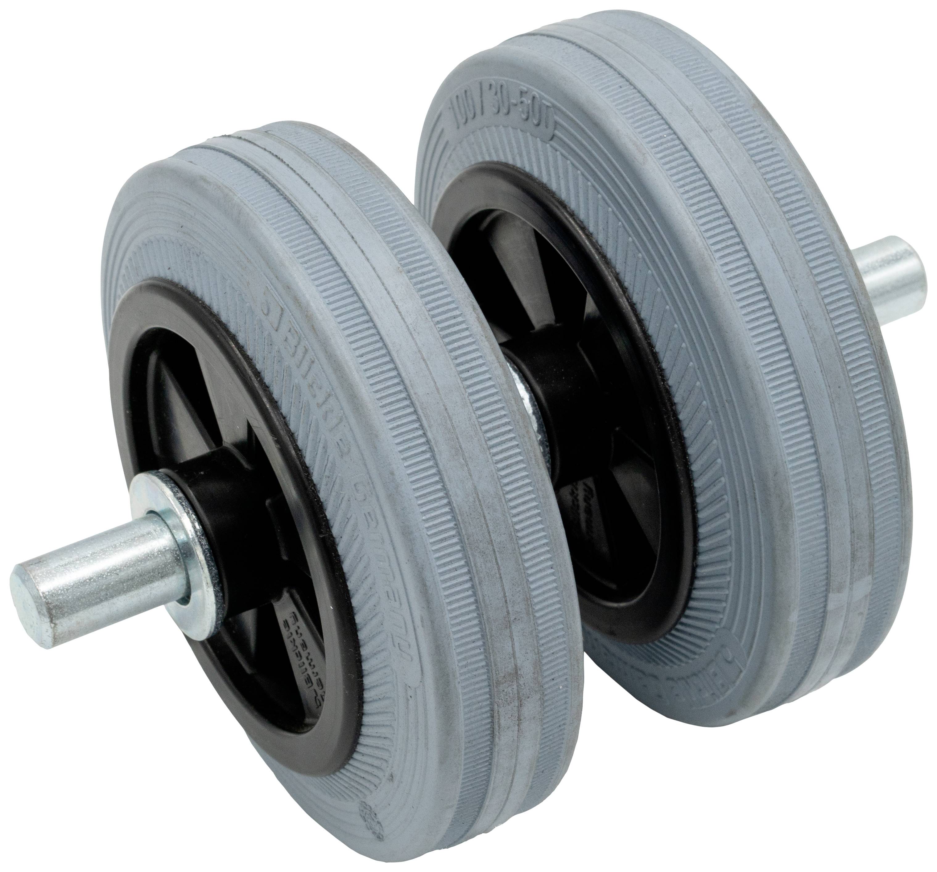 Une barre d'haltérophilie grise avec plusieurs disques de chaque côté est posée horizontalement. Adaptée pour l'entraînement de musculation et les exercices de fitness.