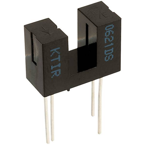 Un capteur optique noir de type U avec quatre broches de connexion, portant l'inscription 'K.TIR' et '0621DS'. Il est utilisé pour la détection d'objets.