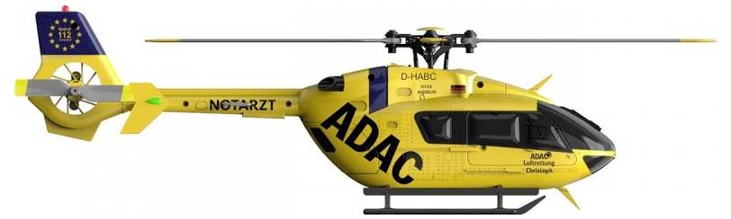 Hélicoptère de secours ADAC jaune avec l'inscription 'NOTARZT' sur le côté, prêt pour des missions de secours médicaux.