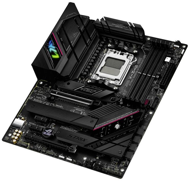 Carte mère avec des emplacements RAM vides, un socket CPU et des slots PCIe, marquée 'STRIX'. Noir avec des accents colorés.