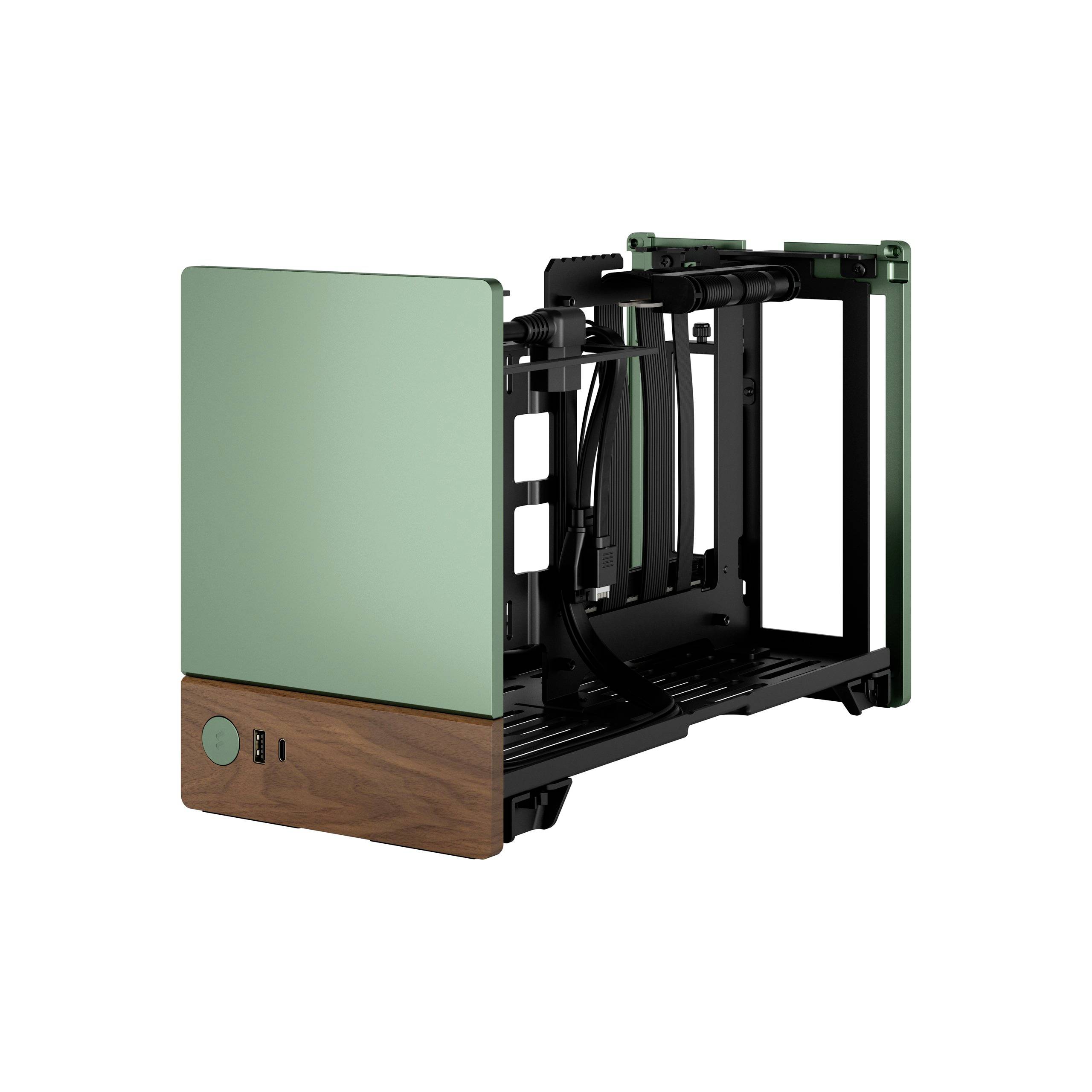Boîtier d'ordinateur ouvert de couleur verte avec des touches de bois. Vue de face présentant un interrupteur principal et deux ports USB.