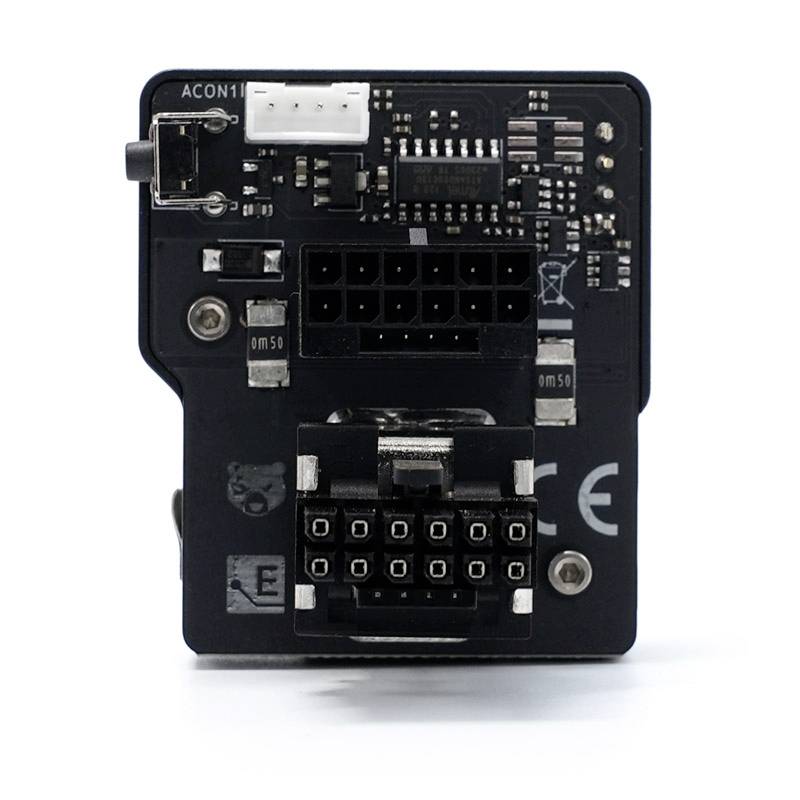 'Carte électronique avec plusieurs connexions, comprenant deux barrettes de connecteurs et plusieurs composants électroniques, sur fond blanc.'