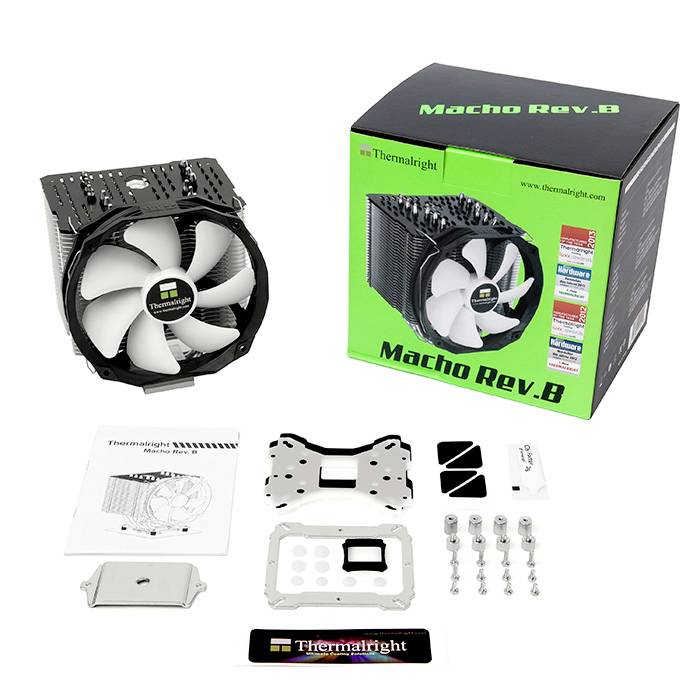 'Image d'un ventirad de processeur : Le Thermalright Macho Rev. B avec ses accessoires tels que supports et vis, présenté à côté de son emballage.'