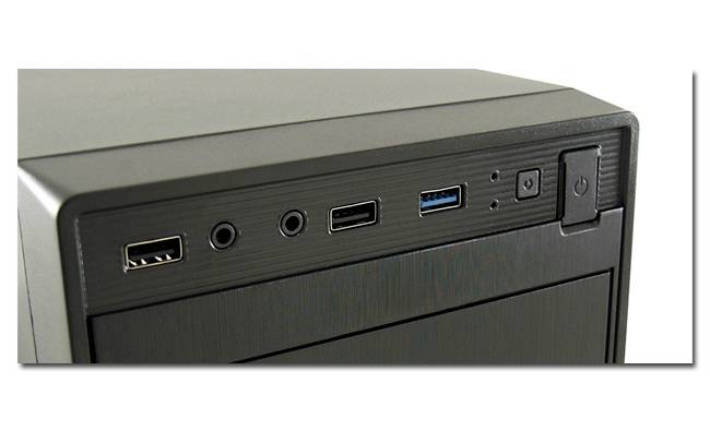 Vue avant d'un boîtier d'ordinateur avec plusieurs ports : USB, entrée audio, sortie audio, USB 3.0, boutons de mise en marche et de réinitialisation.