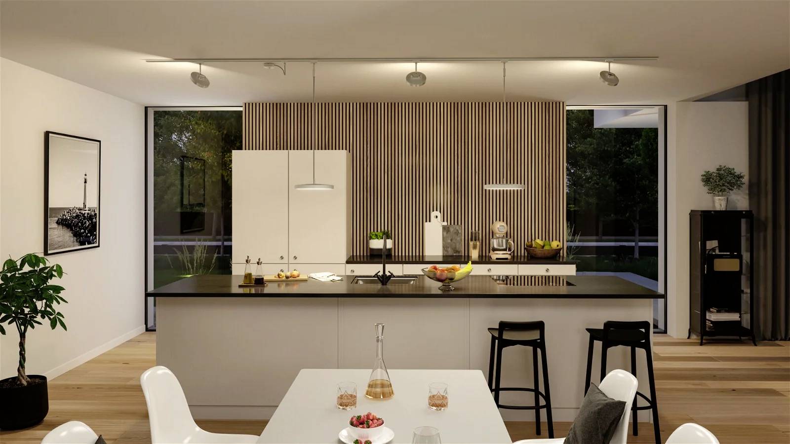 Cuisine moderne avec un grand îlot central ; entourée d'armoires blanches et de panneaux de bois. Sur le côté, une table à manger avec des chaises blanches.
