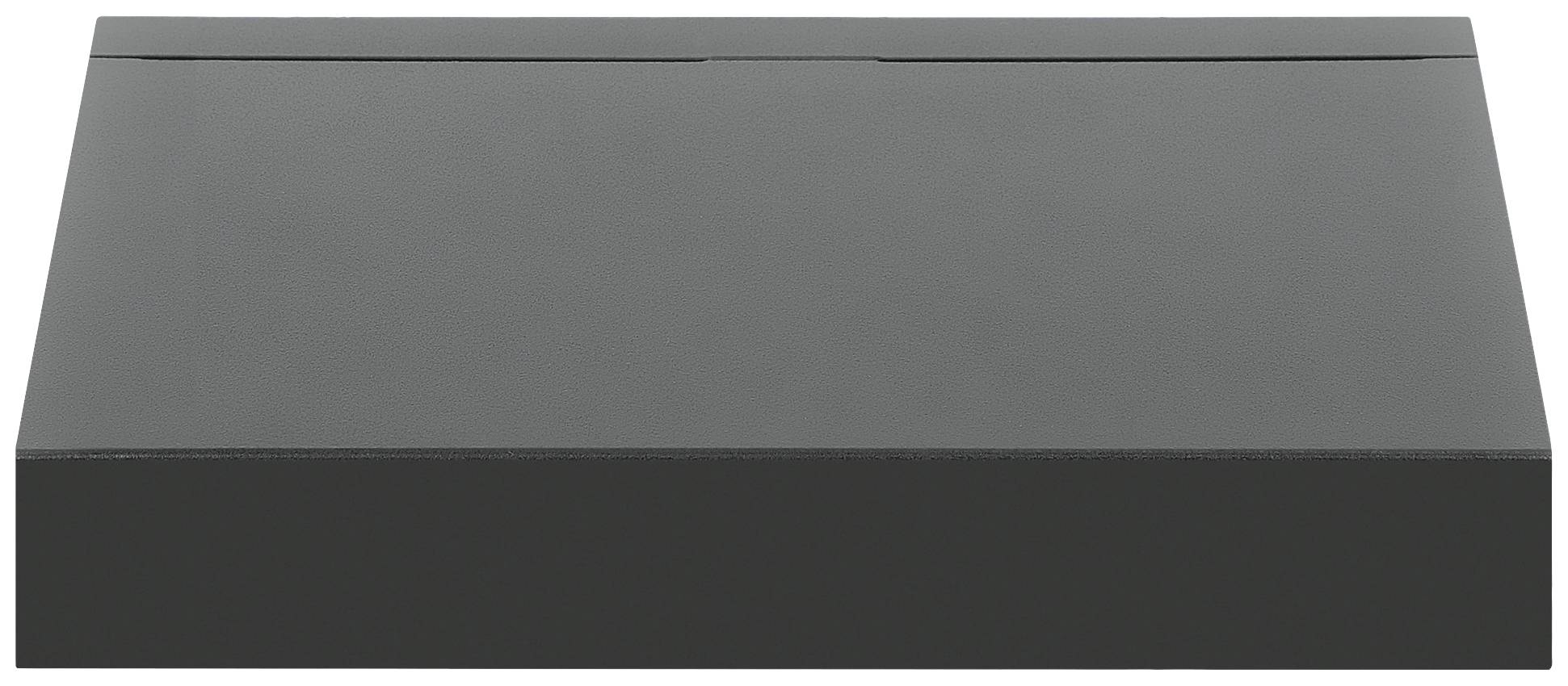 Objet noir, rectangulaire et plat avec une surface lisse, possiblement une boîte ou une plateforme, sur un fond neutre.