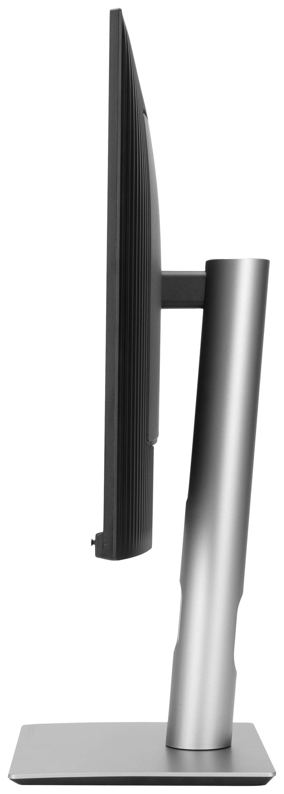 Une vue latérale d'un écran d'ordinateur moderne et élancé, avec un pied en argent, posé sur une table.