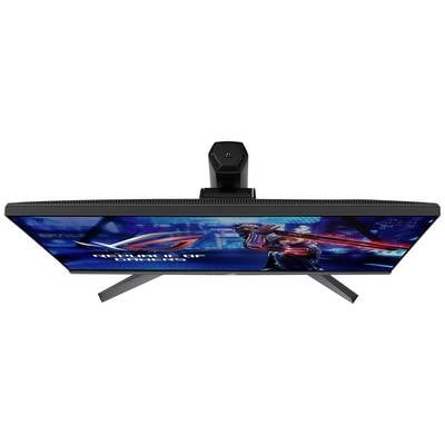 Un moniteur de jeu vu de dessus, révèle une scène futuriste avec une figure et le logo 'Republic of Gamers'.