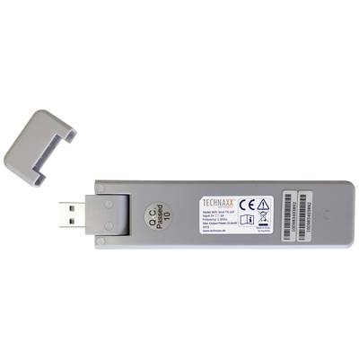 Appareil USB 'TECHNAXX' avec couvercle retiré. L'étiquette contient des informations sur le produit et le marquage CE.