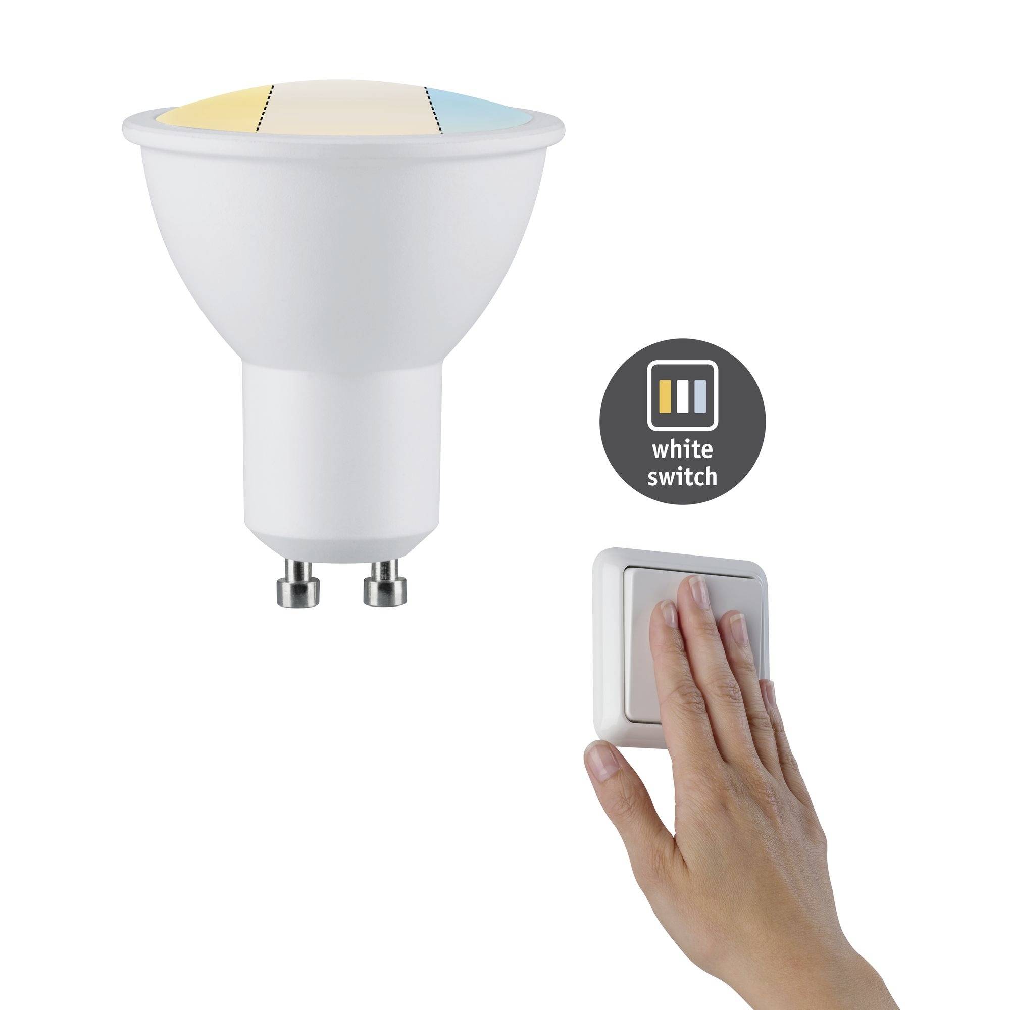 Une main appuie sur un interrupteur. Un voyant LED blanc affiche 'white switch'. En haut à gauche se trouve une ampoule marquée en jaune, bleu et blanc.