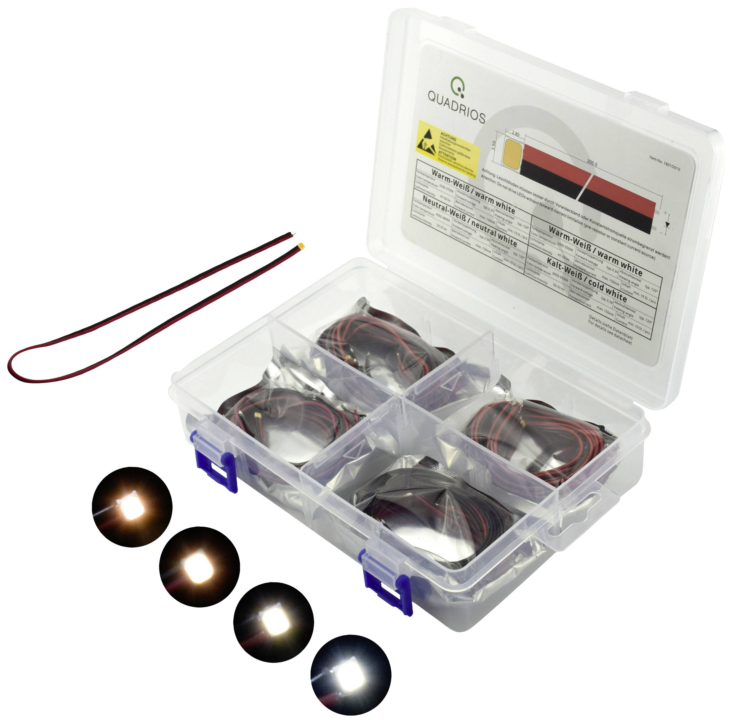 Boîte de rangement transparente à plusieurs compartiments, remplie de composants LED et de câbles. Des instructions sont imprimées à l'intérieur du couvercle.