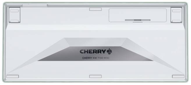 Face arrière blanche d'un clavier avec une étiquette grise au centre sur laquelle est inscrit « CHERRY KW 7100 MINI ».