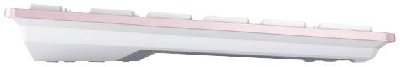 Vue latérale d'un clavier d'ordinateur blanc avec un cadre rose en haut.