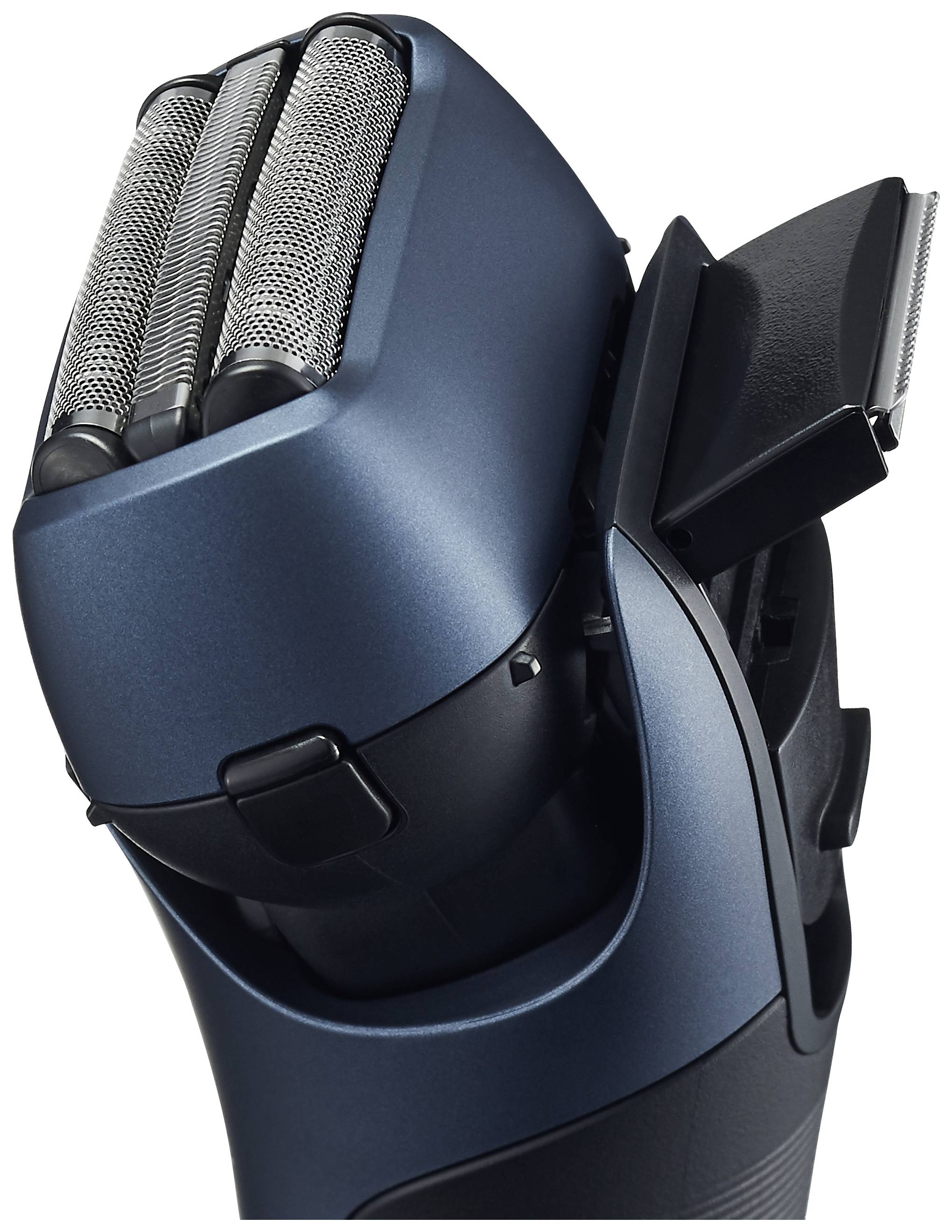 Rasoir électrique à deux têtes de coupe et tondeuse. Appareil dans un boîtier bleu foncé, adapté pour un rasage précis et un travail des contours.