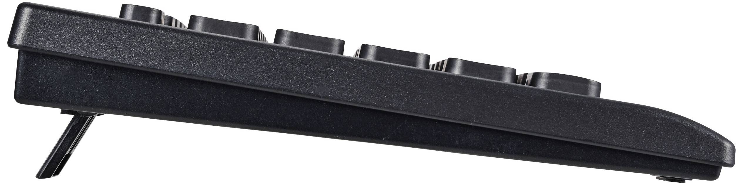 Vue latérale d'un clavier d'ordinateur noir avec supports relevés, montrant l'inclinaison pour une utilisation ergonomique.