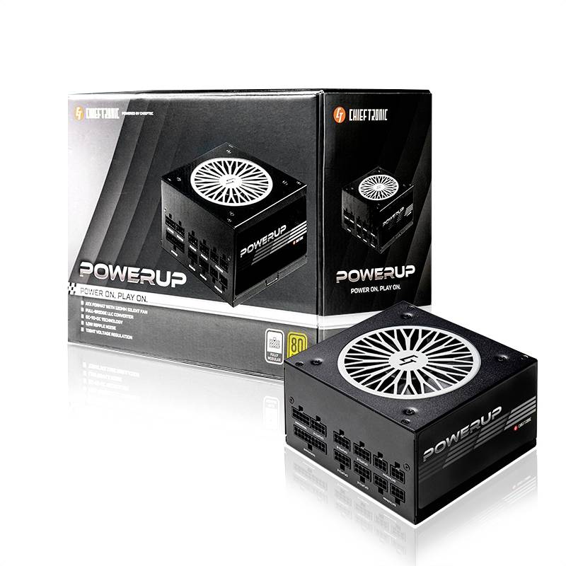 Emballage en carton d'un boîtier d'alimentation d'ordinateur avec l'inscription 'Power Up'. Le boîtier présente l'image du produit avec un ventilateur et les détails des connexions.