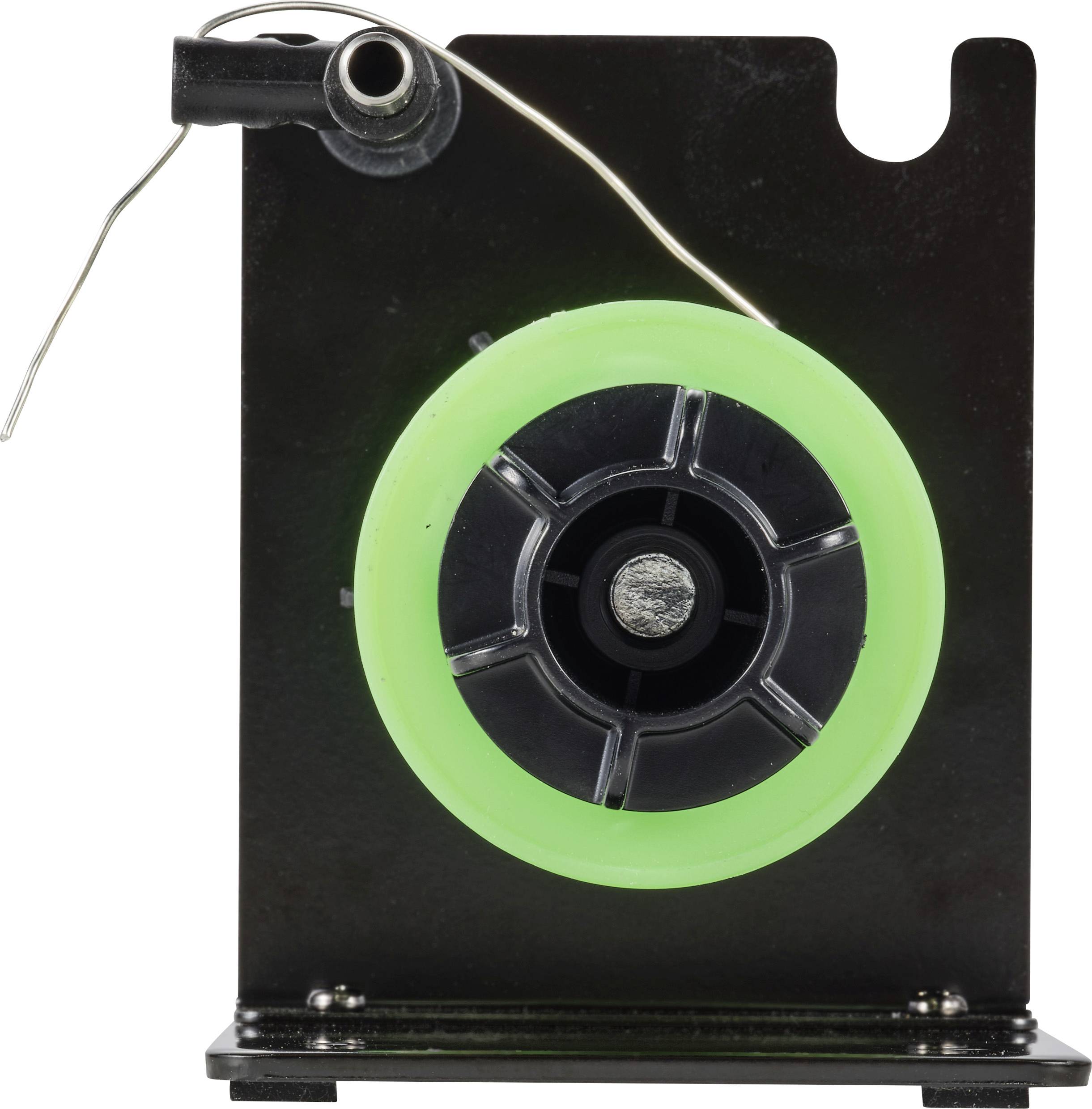 Un appareil noir affiche une roue verte au centre, avec un fil et un petit composant métallique en haut à gauche.