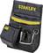 Un sac à outils noir avec le logo jaune 'Stanley', doté de plusieurs compartiments et supports, appelé sacoche de finition.