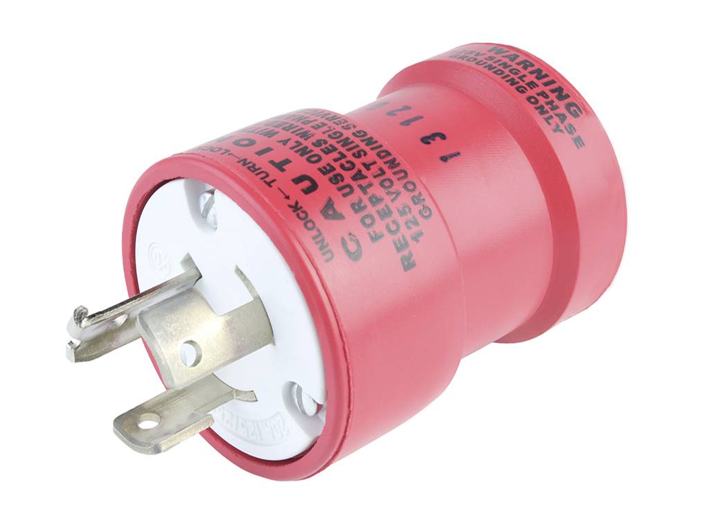 Adaptateur secteur rouge avec trois broches métalliques et des avertissements sur la face avant. Adapté aux applications électriques.