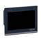 Un dispositif de commande Harmony en noir et gris de Schneider Electric avec écran tactile, de forme rectangulaire, destiné au pilotage de machines.