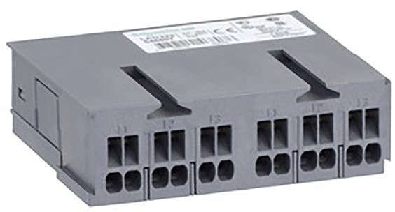 Un grand appareil de bloc de terminaux gris avec plusieurs bornes de connexion sur l'avant. En haut, une étiquette avec des spécifications techniques.