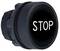 Bouton rond noir avec inscription blanche 'STOP'.