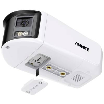 Caméra de surveillance avec détecteur de mouvement et vision nocturne. La caméra montre le compartiment des piles ouvert et un couvercle éloigné.