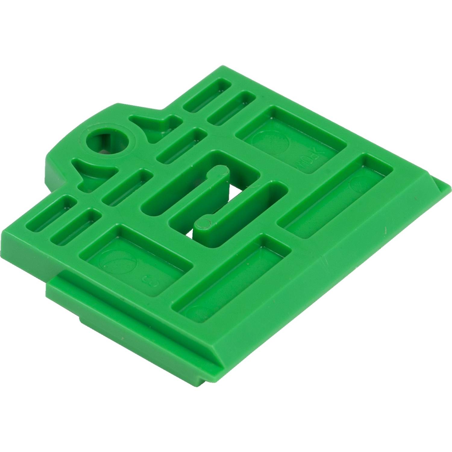 Un outil en plastique vert avec plusieurs fentes et ouvertures, probablement utilisé pour des applications de positionnement précis.