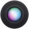 Un haut-parleur rond noir tricoté avec un écran lumineux changeant de couleur au centre, portant des symboles plus et moins.