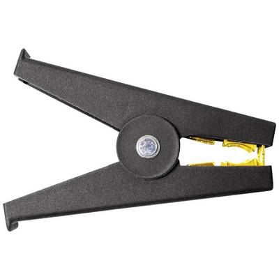 Un trombone noir avec des accents jaunes, formant une shape de pince, est ouvert et posé sur une surface blanche.