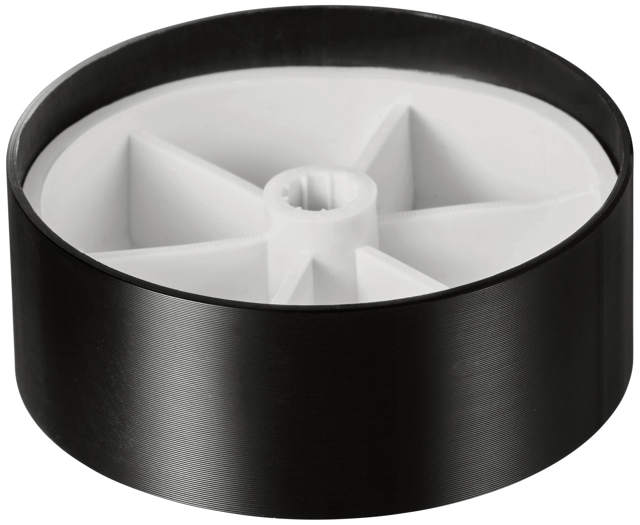 Roue en plastique noir avec une structure de rayons blanc en forme d'étoile au centre. La roue pourrait convenir à des jouets ou à de petits appareils.